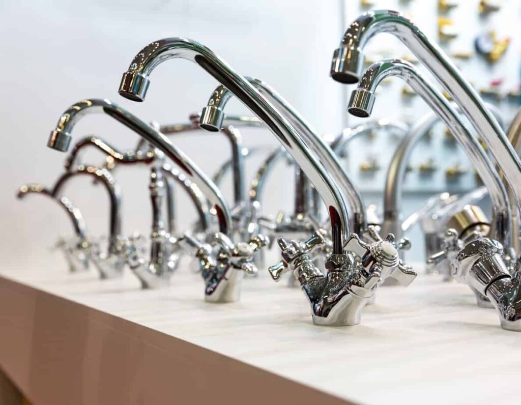 kitchen-faucets-on-shelf-closeup-plumbing-shop.jpg